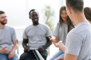close up. a group of young people sitting in the conference room