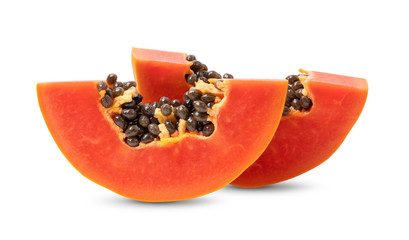 Ripe papaya fruit cut in half on white background