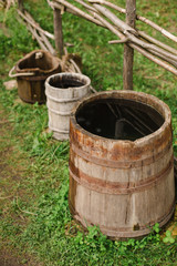water barrels in the garden on the grass.