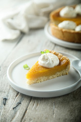 Homemade pumpkin pie with whipped cream