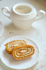 slice of honey roll on a white table