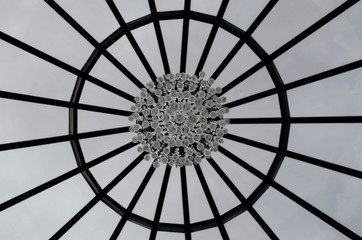 chandelier glass balls high under glass dome