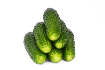 green cucumbers on a white background
