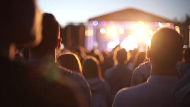 Crowd at open air in the evening summer time