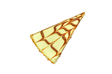 Fototapeta na wymiar Triangular piece of cake with frosting and chocolate. Fresh pastries, top view. Close-up, isolate