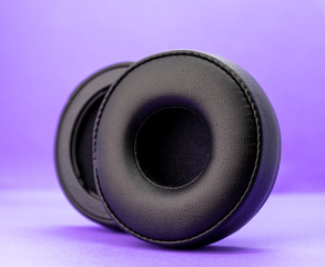 earpads on purple background front view
