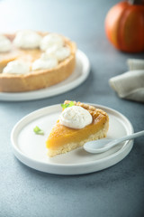 Homemade pumpkin pie with whipped cream