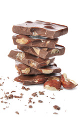 Sweet chocolate with nuts on white background