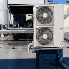 Air conditioning unit with fans on the beam.