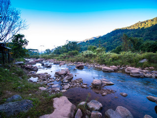 White Chair on The Rock with Stream Flowing Through
