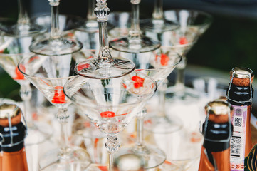 pyramid of champagne with beautiful lighting of glasses