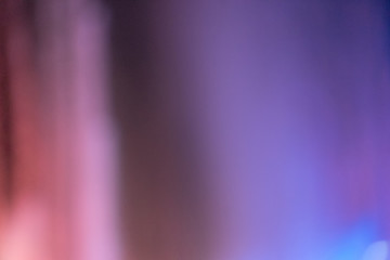 Neon background of light and water splashes