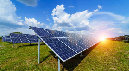 Solar panels on the sky background. Solar power plant. Blue solar panels. Alternative source of...