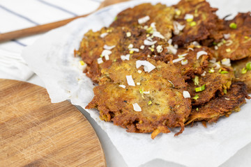 Fried grated potatoes pancakes served on the plate