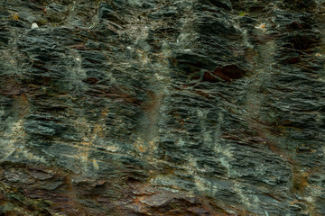 rocky cliffs on a high mountain where travel