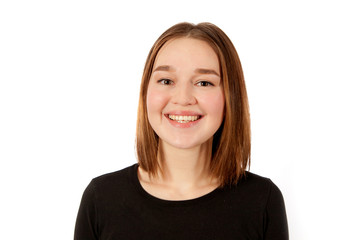 Portrait of young smiling woman isolated on white