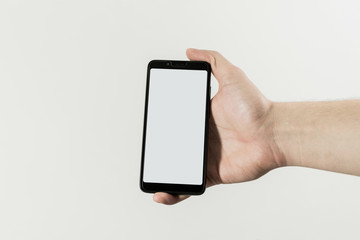 Hand male with Cell phone on white background.