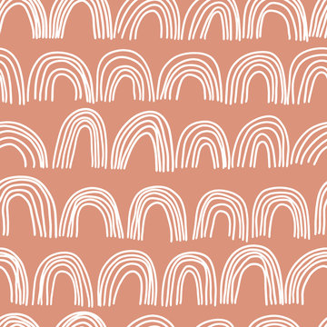 Boho rainbows seamless pattern, hand drawn bohemian rainbows, doodle illustration, vector background, design for textiles, product packaging, posters