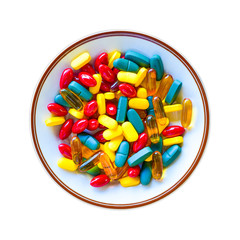 Vitamin pills served plate isolated on white background. Omega 3 pill, multi vitamin pill and b vitamin pill serving in dish. Colorful food supplement pills.