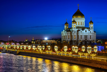 Fototapeta na wymiar Cathedral of Christ the Savior and Moscow river in Moscow, Russia. Architecture and landmark of Moscow. Night cityscape of Moscow