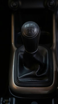Close up of the gear shift lever of the car