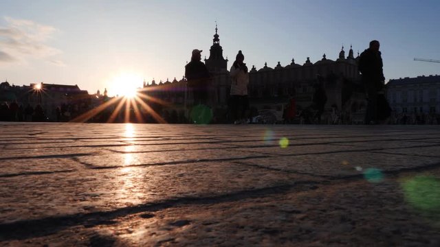 Cloth Hall on Medieval Main market square during sunset in Krakow, Poland (2x downspeed)