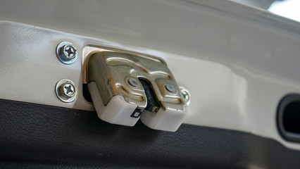 Close up the car trunk door lock