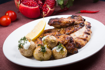 Grilled chicken with potatoes