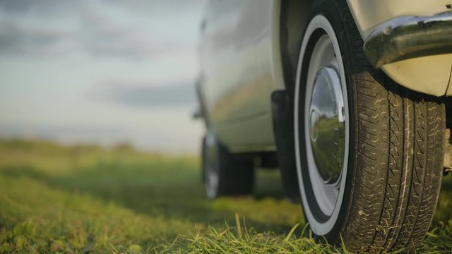 Front tire of old white vintage soviet car