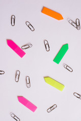 Office supplies on a white background. Paper clips made of metal. Office for study and business.