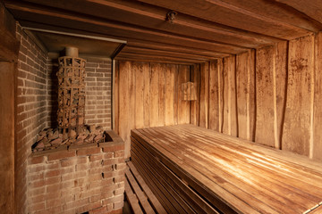 sauna bathhouse warm interior inside empty brooms barrels bucket for water