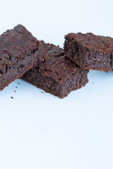Vegan brownies chocolate plant based diet no animal products on dark background