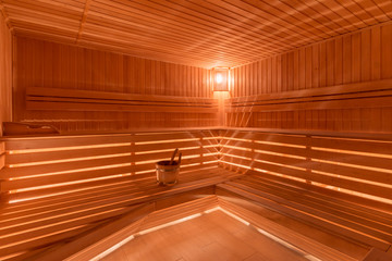 sauna bathhouse warm interior inside empty brooms barrels bucket for water