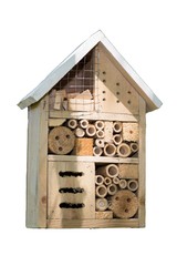 Wooden insect hotel shelter for wild insects in garden on white background
