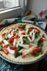 Quiche, cheese, tomato and spinach pie