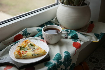 Quiche, cheese, tomato and spinach pie