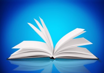 Open study book on blue background