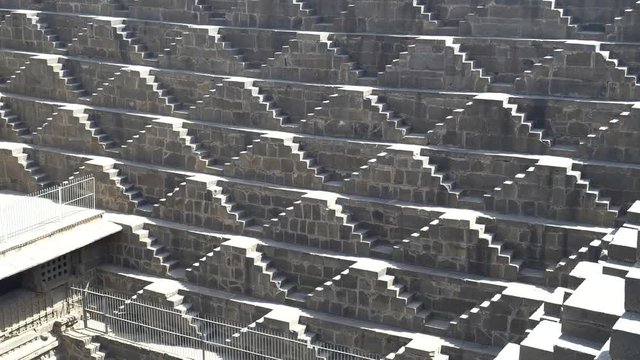 zoom in on steps of chand baori, a stepwell situated in the village of abhaneri in the indian state of rajasthan