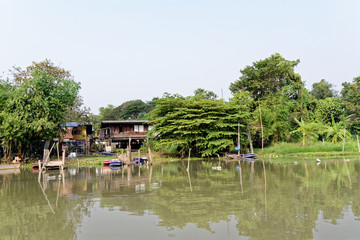 Fototapeta na wymiar Traditional Thai house by the water
