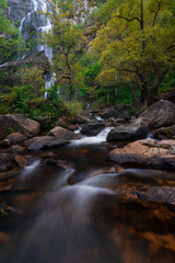 Obraz premium Waterfall in autumn forest at Erawan National Park, Thailand