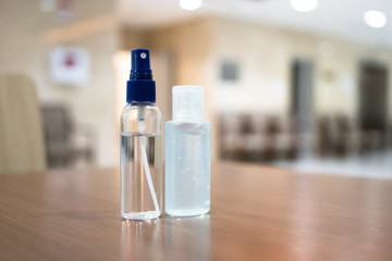 Coronavirus disease (COVID-19) prevention set, medical surgical face masks and hand sanitizer gel bottle for hand hygiene, health care concept.