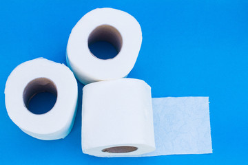 isolate paper towel rolls. white tissue paper for clean every think on blue background.