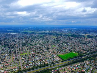 Fototapeta premium Above St Clair Drone panorama aerial view of Sydney NSW Australia city Skyline and looking down on all suburbs 