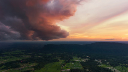 Rainforest with limestone mountains surrounding. Sunrise In the south of Thailand