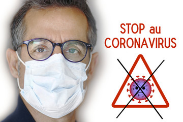Un homme porte un masque contre le Coronavirus COVID-19 nCOV, docteur, médecin avec un masque...