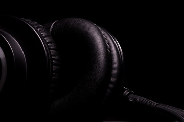 Beautiful details of professional studio headphones close-up on a black background