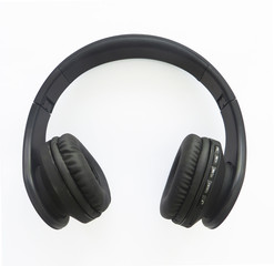 Front view of black wireless headphones on white background. Rotating, compact and lightweight headphones for easy portability.