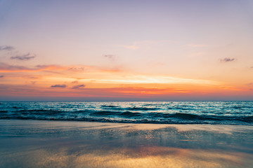 Naklejka na ściany i meble Beautiful sunset at the beach