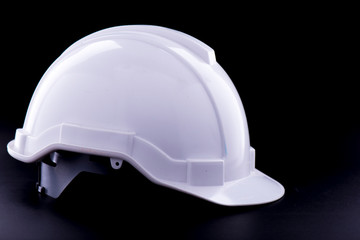 White Safety helmet on black background