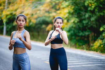 Fototapeta premium Women exercise happily for good health. Exercise concept